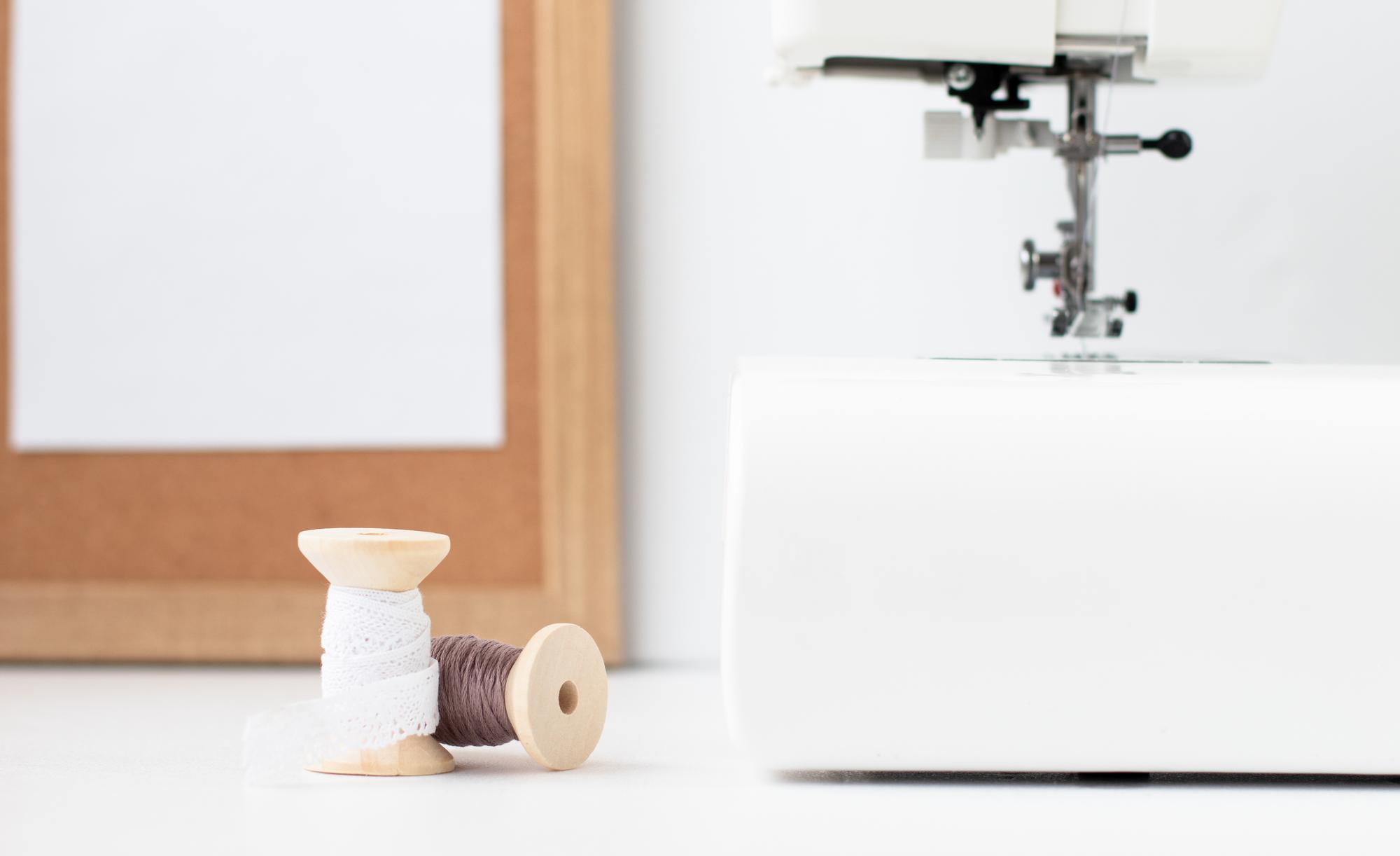 Interior of embroidery atelier with light and wooden table
