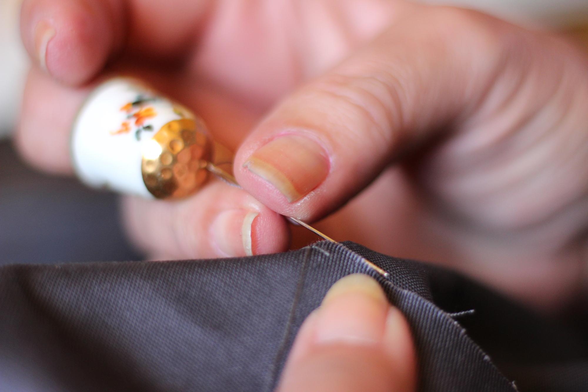 Close-up of hand embroidery on silk fabric