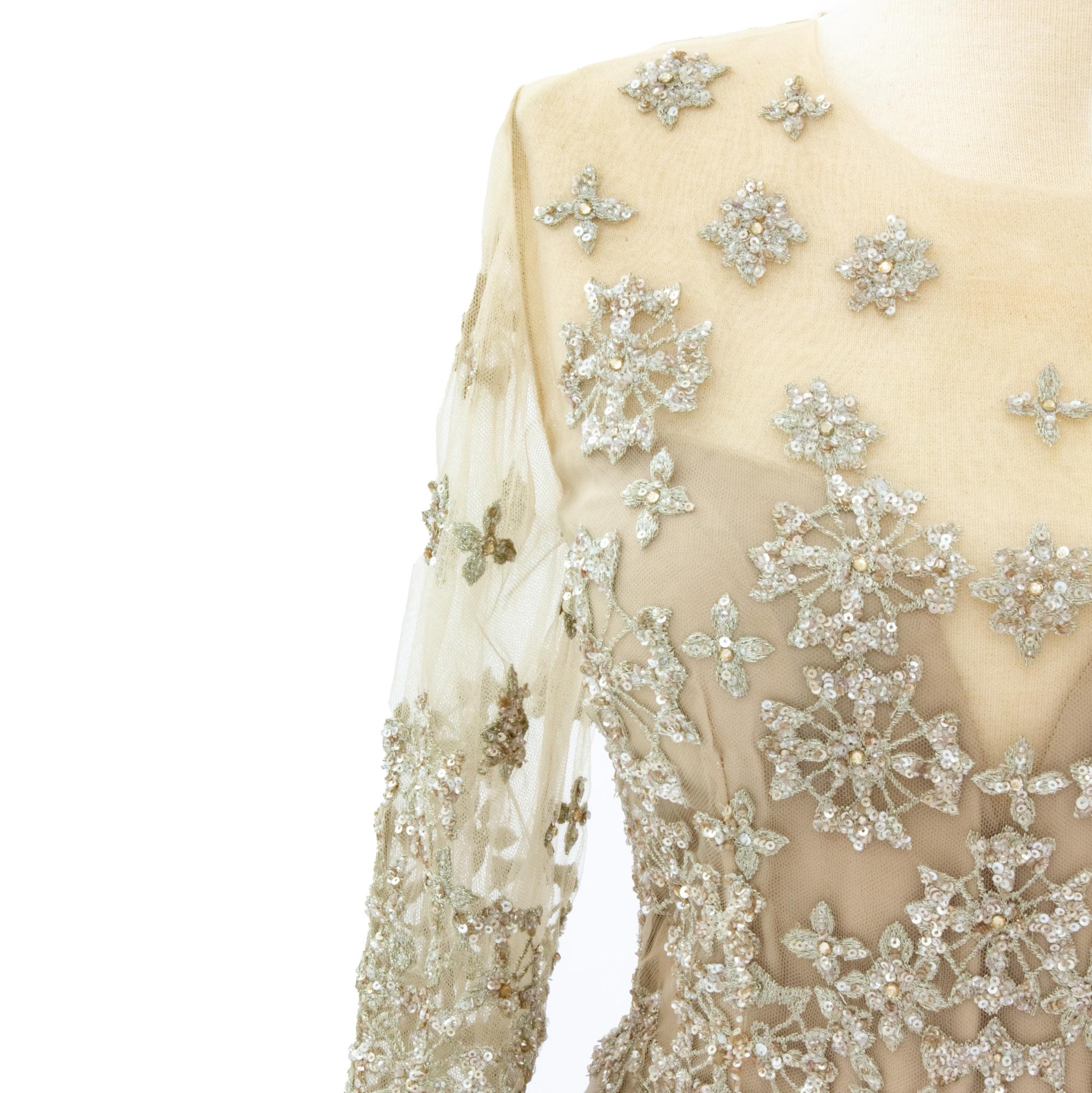 Bridal gown back with floral embroidery